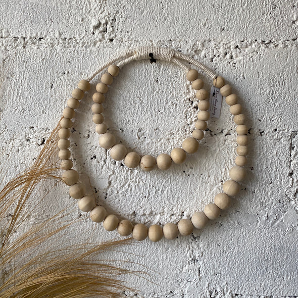 ROUND DOUBLE NATURAL BEADS